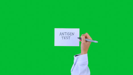 Arzt-Schreibt-Antigentest-Auf-Papier-Mit-Grünem-Bildschirm